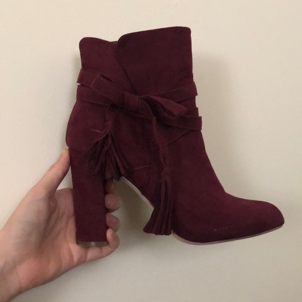 Pair of burgundy booties